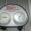 In the Stevens Point Brewery's engine room showing the ammonia pressure gages